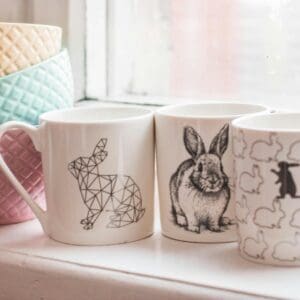 A close up of four mugs on a table