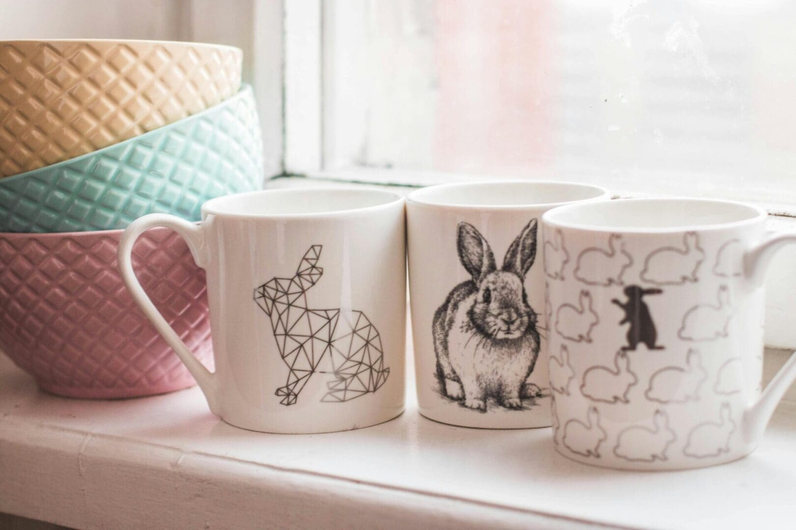 A close up of four mugs on a table