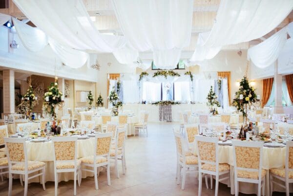 A large room with many tables and chairs